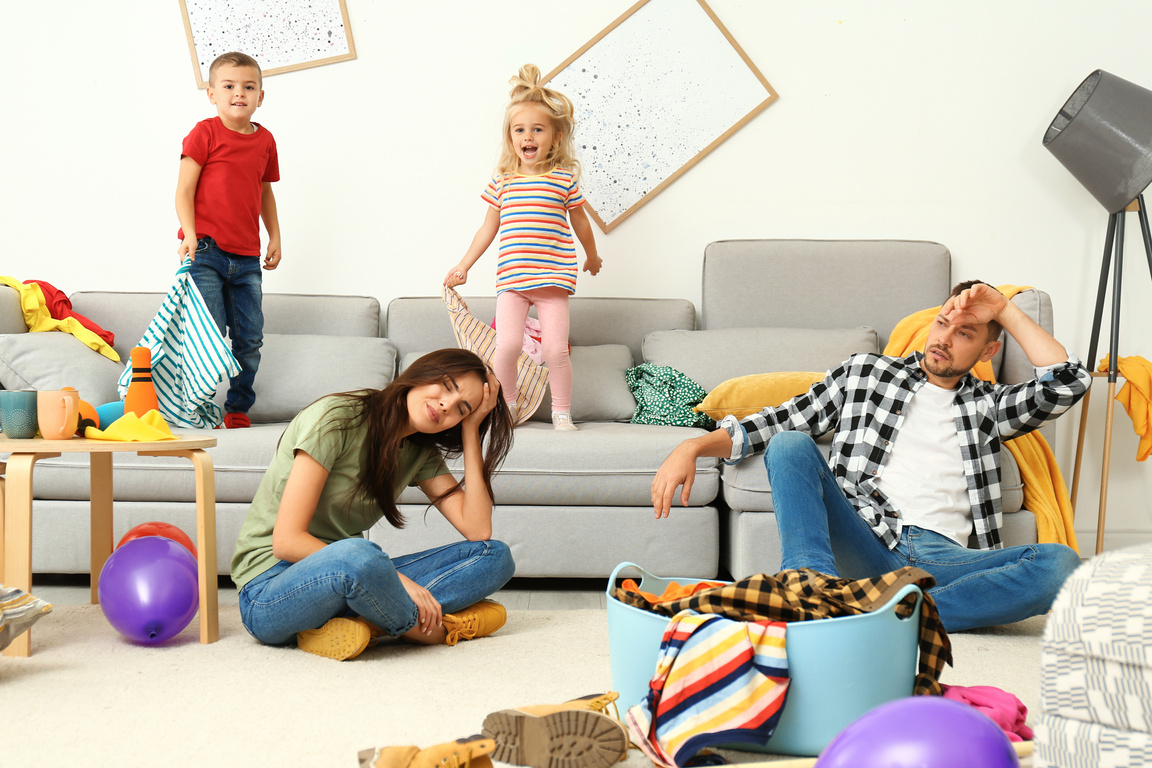 Frustrated Parents and Their Mischievous Children in Messy Room