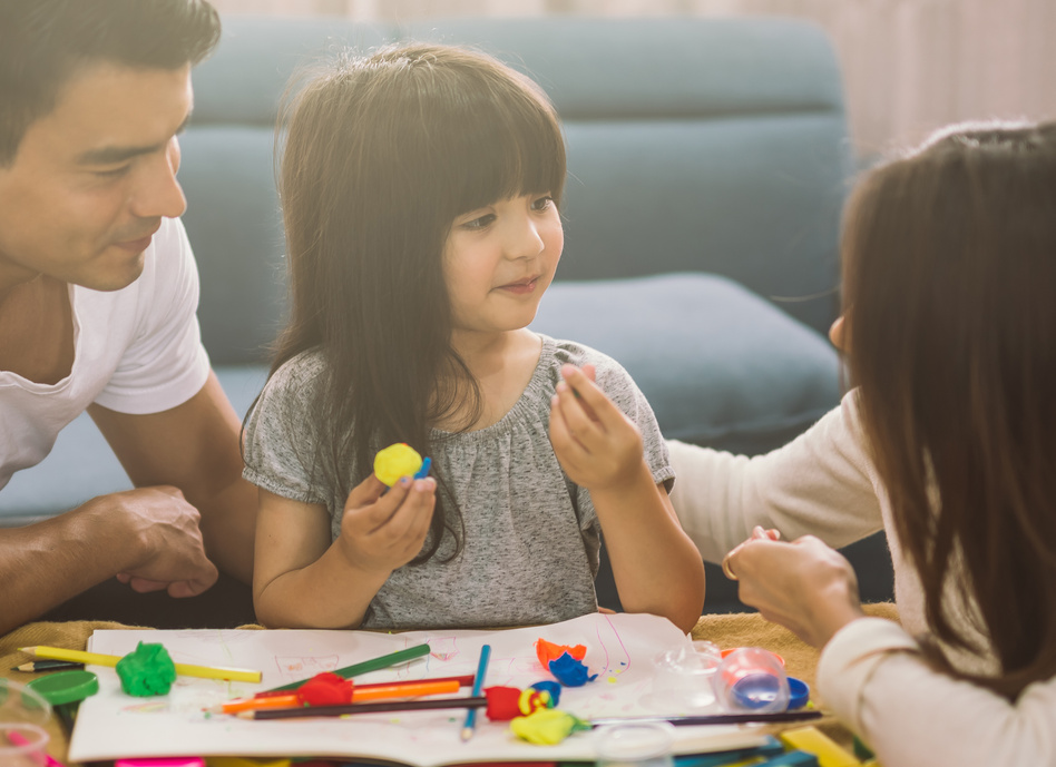 Kid Playing with Parents